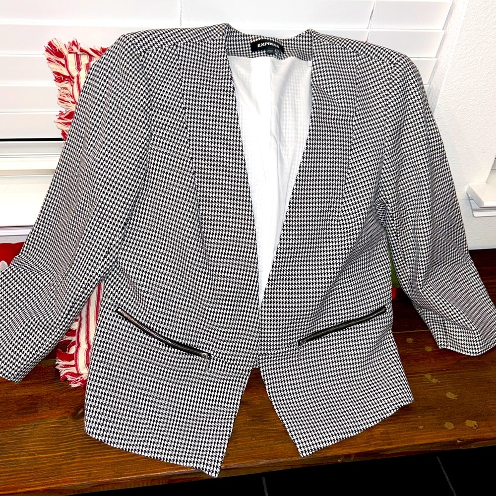 White and black blazer